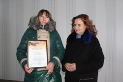 Ганаровай граматай абласной прафсаюзнай арганізацыі
работнікаў АПК узнагароджана Аксана Кудраўцава